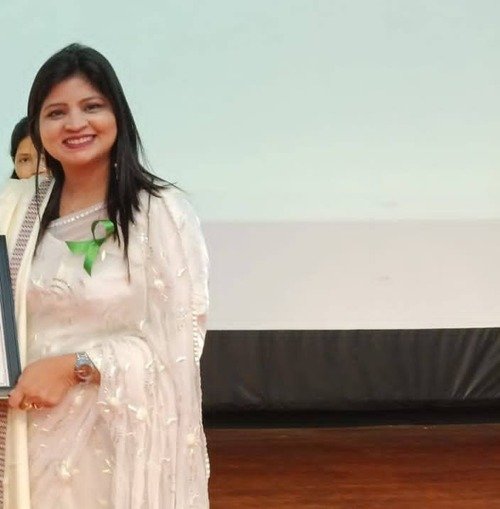 Dr. Firdos Jahan receiving Certificate of Appreciation
